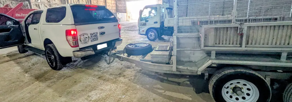 Rubbish Removal Brisbane ute and tipper trailer unloading at a licensed recovery tipsite